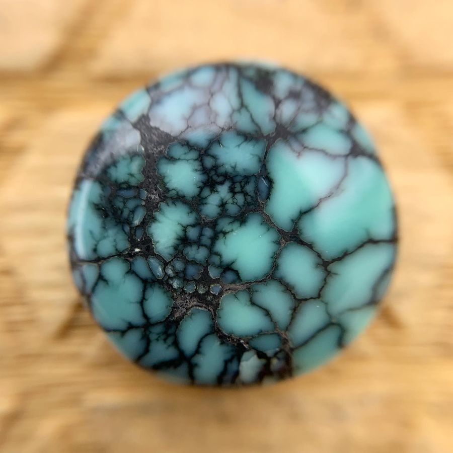 Polished variscite cabochon from the Colina Verde mine, Nevada