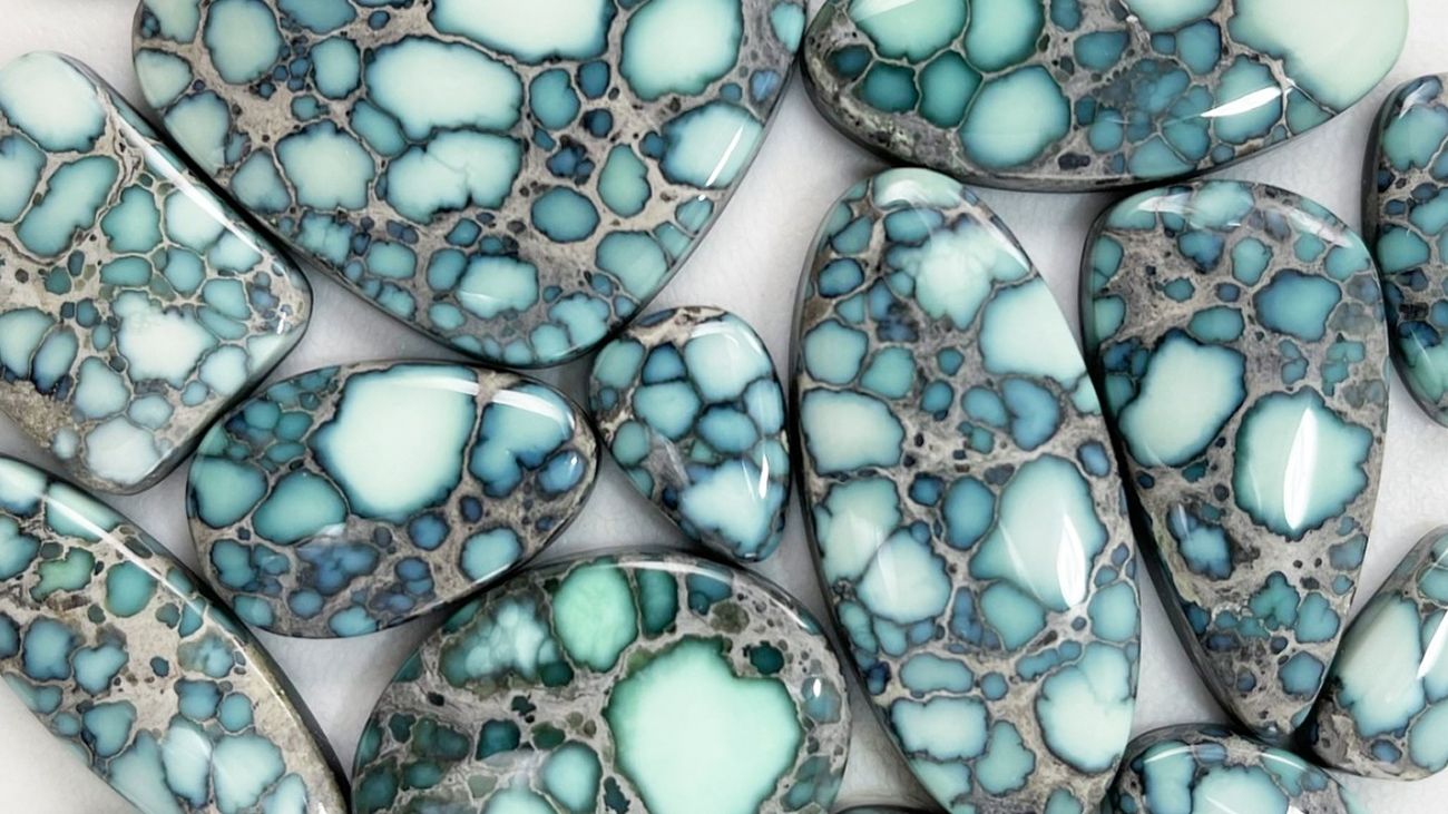 Calypso variscite with icy blue spiderweb in steely gray matrix, Esmeralda County, Nevada