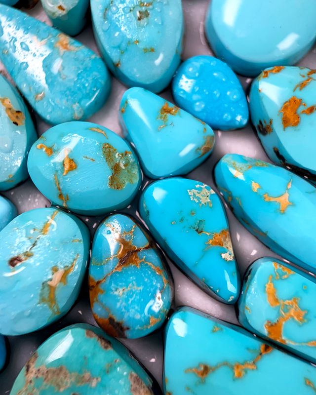 Jolly's Lost Blue turquoise cabochons, bright blue with golden matrix, Nye County, Nevada